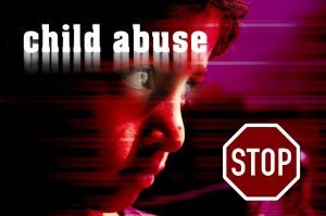 a sign saying stop child abuse